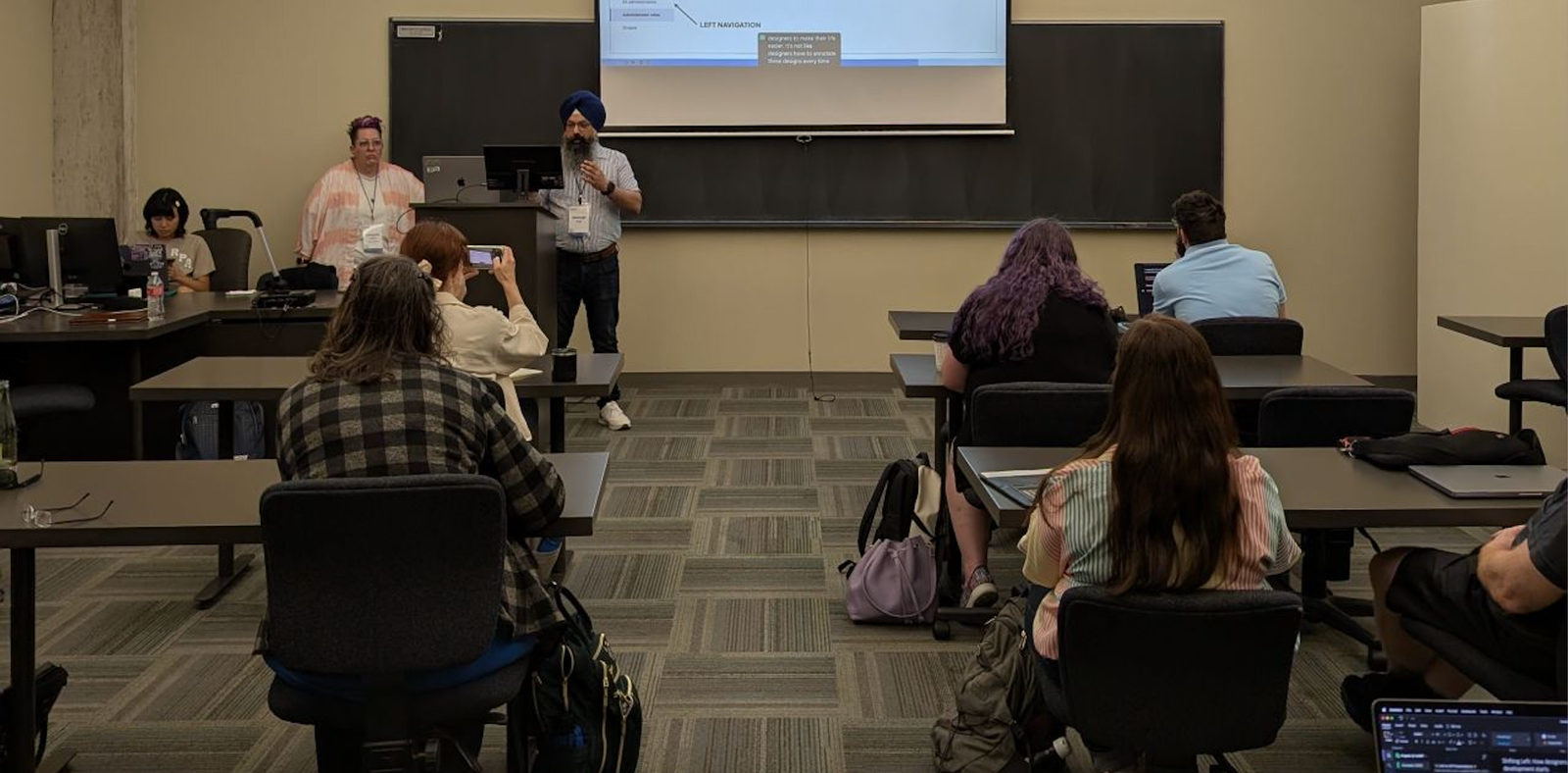 Simran presenting at AccessU with Georgette